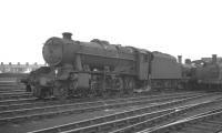 Stanier 8F 48476 stands in the shed yard at Workington on 22 September 1962.<br><br>[K A Gray 22/09/1962]