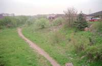 The site of Whitburn station, looking south in May 1997. The station was located at East Whitburn. [See image 44781] for a view of the bridge from which this photograph was taken.<br><br>[Ewan Crawford 03/05/1997]