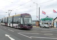 Although the loop directly outside the Fleetwood Ferry entrance is still used by occasional heritage tram services the actual tram stop is now round the corner and built for level access to the Flexity trams. 015 passes through the loop as it sets off for Starr Gate. [See image 23892] <br><br>[Mark Bartlett 10/08/2013]