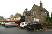 The two coaches located alongside the platform at Bellingham, seen here in November 2013, provide a tea room and exhibition space for the local heritage centre which stands off picture to the right. The old station building itself is used as offices by the local council.<br><br>[John Furnevel 06/11/2013]