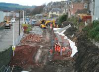 The view north over the trackbed from above Ladhope tunnel, Galashiels, on 10 December 2013. The footbridge linking Low and High Buckholmside stands in the background.<br><br>[John Furnevel 10/12/2013]