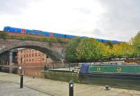 A First TransPennine class 185 crossing the viaduct over Castlefield Basin Manchester in September 2009.<br><br>[Ian Dinmore /09/2009]
