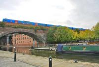 A First TransPennine class 185 crossing the viaduct over Castlefield Basin Manchester in September 2009.<br><br>[Ian Dinmore /09/2009]