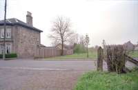 View west at the site of Slamannan station in May 1997. The station was in the field on the right. The photograph is from beside the site of the signalbox. Nothing remains today, not even the old railway fencing in the foreground.<br><br>[Ewan Crawford 03/05/1997]