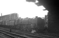 72009 <I>Clan Stewart</I> in the west sidings alongside Carlisle station on 11 April 1964 with the 10.50am Perth parcels.<br><br>[K A Gray 11/04/1964]