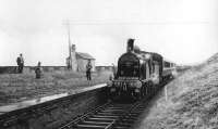 CR 123 with the preserved Caledonian coaches standing at Skares station, East Ayrshire on 20 April 1962 with the first of the Easter <I>Scottish Rambler</I> railtours. The BLS/SLS special was making a photostop here on its way from Muirkirk to Ayr. [Ref Query 6882]<br><br>[David Stewart 20/04/1962]