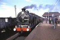 J37 0-6-0 no 64569 at Leuchars Junction on 28 August 1965 with the RCTS <I>Fife Coast Rail Tour</I> getting ready to leave for St Andrews. [See image 20522]<br><br>[G W Robin 28/08/1965]