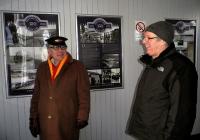 Posters in the waiting room at Dalwhinnie, prepared for the HML 150th anniversary by local graphic designer Jules Akel, seen left alongside Angus Munday, husband of station adopter Deborah [see image 44409].<br><br>[John Yellowlees 17/12/2013]