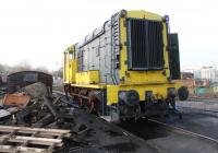 Dutch <I>Class 11</I> 0-6-0DE NS 663 undergoes light maintenance outside the Ribble Steam running shed and workshops on 14th December. LMS/BR Class 11 shunters were not fitted with train brakes but the Dutch versions were air brake fitted as seen here. NS 663 is one of two on the RSR as NS 601 is on static display in the museum here. Both locos were built in Preston by English Electric. <br><br>[Mark Bartlett 14/12/2013]