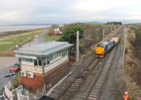 DRS 37606 leads a single flask from Sellafield to Heysham and sister EE Type 3 37688 past the disused signal box and onto the chord to Bare Lane on 18th December 2013. I originally entitled this image <I>The once a week crossover</I> but have since found that an early morning ECS working from Barrow Cariage Sidings to Morecambe also uses it. <br><br>[Mark Bartlett 18/12/2013]