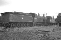 Drummond <I>Greyhound</I> 4-4-0 no 30287 of 1900, standing in the sidings alongside Eastleigh shed on 13 August 1961, less than a month prior to its official withdrawal by BR.<br><br>[K A Gray 13/08/1961]
