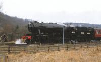 WD Austerity 2-10-0 no 90775 runs into Levisham on 7 April 1996 with a train on the North Yorkshire Moors Railway.<br><br>[Peter Todd 07/04/1996]