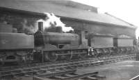 Drummond Caledonian 2F 0-6-0 57300 alongside Hurlford shed in April 1962.<br><br>[David Stewart 17/04/1962]