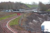 Looking south west along the turnback siding at the north end of Millerhill Yard on 20 December 2013. The route to Tweedbank will continue beyond the buffer stops towards the new station at Shawfair.<br><br>[John Furnevel 20/12/2013]