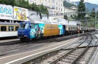 <I>The Chocolate Train,</I> comprising six renovated luxury coaches, arrives back in Montreux behind colourful metre gauge Ge 4/4 No. 8002 on 8 September 2013. The loco is one of four built in 1994 for the MOB to the same design as 641 to 652 on the Rhaetian Railway [See image 44871]<br><br>[Mark Bartlett 08/09/2013]