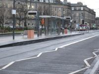 View south from Shandwick Place tram stop on 8 December 2013. A crossover is sited at the far end to allow trams to reverse from the platform face nearest and run back towards Haymarket Station which is located off picture in the right background. [See image 41476]<br><br>[David Pesterfield 18/12/2013]