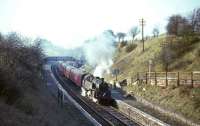 Standard class 4 tank 80046 calls at Clarkston in April 1966 with an evening train for East Kilbride.<br><br>[G W Robin /04/1966]