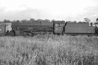 Corkerhill Jubilee 45665 <I>Lord Rutherford of Nelson</I> stored in Lugton sidings on 26 June 1962. 'Official' withdrawal by BR did not take place until several months after the photograph was taken, although the locomotive's next and final journey would be back to Glasgow, where it was cut up in the yard of Messrs Campbell at Shieldhall in December 1963.<br><br>[John Robin 26/06/1962]