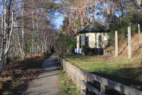 The old station building at Cambus o' May, Deeside line, looking west to Ballater on 26 December. The two concrete posts which held the station name board, presumably late LNER or BR, still stand on the right.<br><br>[Brian Taylor 26/12/2013]