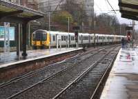 The inaugural FTPE class 350 scheduled Anglo-Scottish service on the return journey from Glasgow to Manchester on 30 December 2013. The train is seen here leaving Preston platform 3 with 350403 leading 350401.<br><br>[John McIntyre 30/12/2013]