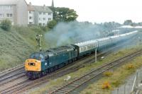 A return excursion departing from a busy Largs station in 1984 hauled by an unidentified class 40 [see image 45812].<br><br>[Colin Miller //1984]