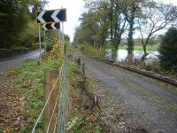 The Corwen extension on the Llangollen Railway seen at its mid point railhead at Bonwm on 4 November 2013. View is west towards Corwen, with the trackbed at this location sandwiched between the A5 road on the south side and the River Dee to the north.<br><br>[David Pesterfield 04/11/2013]