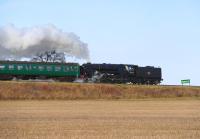 BR Standard class 9F 2-10-0 no 92212 in action near Ropley on the Mid-Hants Railway in December 2013.<br><br>[Peter Todd 28/12/2013]