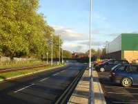 View along the former west to north spur of Wrexham's Croes Newydd triangle towards the Chester to Shrewsbury main line running forward of the houses seen in the distance. A large Wm Morrison supermarket now sits on the site of the former 89C Croes Newydd engine shed.<br><br>[David Pesterfield 03/11/2013]