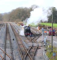 5029 <I>Nunney Castle</I> taking water in the Up Loop at Woodborough on the Berks and Hants line on 9 January 2014. The locomotive was in transit from Minehead to Southall.<br><br>[Peter Todd 09/11/2014]