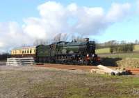 5029 <I>Nunney Castle</I> at speed, approaching the pumping station at Crofton on 9 January [see image 45916]. I did ask Network Rail to shift those sleepers but they said <I>NO</I>... without actually using that particular word...<br><br>[Peter Todd 09/01/2013]