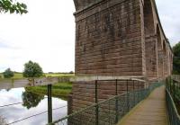 Crossing the River Teviot westbound in the summer of 2013 via the footbridge attached to Roxburgh Viaduct.<br><br>[John Furnevel 13/08/2013]