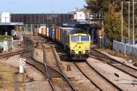 Freightliner 66558 heads south through Oxford station with a container train for Southampton on 22 September 2011.<br><br>[John McIntyre 22/09/2011]