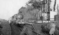 The SLS <I>Farewell to Peebles</I> railtour makes a photostop at Rosslynlee Hospital Halt on 3rd February 1962. J37 0-6-0 no 64587 is in charge.<br><br>[David Stewart 03/02/1962]