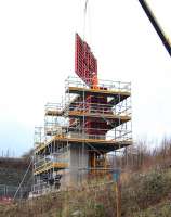 <I>'Got it...'</I> Construction work on the northern support for the Borders Railway bridge over Hardengreen Roundabout in progress on 17 January 2014.<br><br>[John Furnevel 17/01/2014]