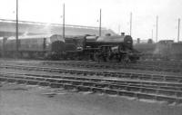 Crab 42744 stands out from the crowd at Balornock Shed in the early 1960s. Other locomotives in the yard include an NBL Type 2 diesel and an ex-Caledonian 0-6-0. <br><br>[David Stewart //1961]