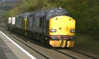 DRS 37606+37419 with Hunterston - Sellafield nuclear flasks through West Kilbride on 8 November 2013.<br><br>[Ken Browne 08/11/2013]