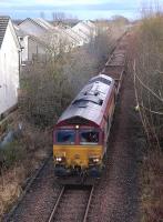 66107 passes Cairneyhill with a Ladybank - Millerhill engineers train on 19 January. Note the housing now occupying the old goods yard.<br><br>[Bill Roberton 19/01/2013]