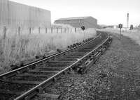 A little to the north of Loanhead Station in November 1986, with a curious adaptation to the track (presumably for stabilisation purposes on the curve). [Ref Query 2839] <br><br>[Bill Roberton 21/11/1986]