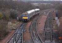 With engineering work at Dalmeny on 25 January causing closure of the line over the Forth Bridge, such trains that ran through Fife had to take the Inverkeithing East/North chord.  170433 was photographed crossing onto the chord at Inverkeithing East Junction on the 2Z64 Dundee - Dunfermline Town service.<br><br>[Bill Roberton 25/01/2014]