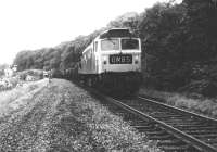 A tracklifting train on the Waverley route just south of Riddings Junction. Thought to have been taken in 1970. [Ref Query 2832]<br><br>[Bruce McCartney Collection //1970]