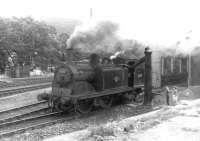 Caledonian 0-4-4T 55217 taking water at Aberfeldy shed in the summer of 1960.<br><br>[David Stewart 18/06/1960]