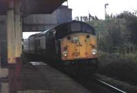 40083 heading west through Salwick with a Euston to Blackpool service on 14 March 1981, before the station canopy was demolished. [Ref query 5203]<br><br>[Mark Bartlett 14/03/1981]