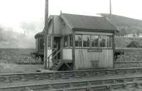 The station signal box at Aberfeldy on 18 June 1960 - almost completely obscuring the branch locomotive, Caledonian 0-4-4T 55217. <br><br>[David Stewart 18/06/1960]