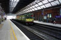 A <I>DART</I> service to Howth awaiting its departure time  at Dublin [Pearce] on 19 January 2014.<br><br>[John Steven 19/01/2014]