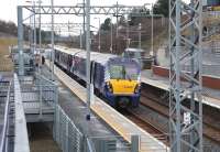 The 10.27 Edinburgh Waverley - Milngavie calls at Livingston North on 30 January 2014.<br><br>[John Furnevel 30/01/2014]