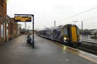 Neither dawn nor dusk, but a horrible dark day as the 10.30 service from Glasgow Central terminates at Ayr one minute early on 31 January 2014.<br><br>[Colin Miller 31/01/2014]