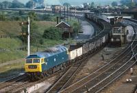 Ex-works 47089 <I>Amazon</I> heads a train of empty 16T mineral wagons north through Wellingborough station on 31 May 1974. The locomotive was allocated to Old Oak Common at the time, suggesting that the train had originated in the London Division of the Western Region.<br><br>[Bill Jamieson 31/05/1974]