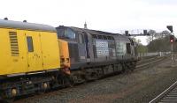 DRS 37603 about to take the Network Rail track recording train away from Kilmarnock on 20 January.<br><br>[Ken Browne 20/01/2014]