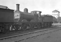 Johnson Midland 2F 0-6-0 no 58260 of 1892 out of use in the sidings alongside Royston shed (55D) on 24 September 1960. Official withdrawal came two months later, followed by disposal through Derby Works.<br><br>[K A Gray 24/09/1960]