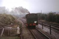 Early preservation days on the East Lancashire Railway with Manchester Ship Canal No. 32 <I>Gothenburg</I> in steam on the short demonstration line in 1979. The operational line to Rawtenstall is on the other side of the boundary fence, still seeing occasional coal trains at this time. When the line re-opened to passengers the demo line was downgraded to stock storage, for which it is still used today. <br><br>[Mark Bartlett //1979]